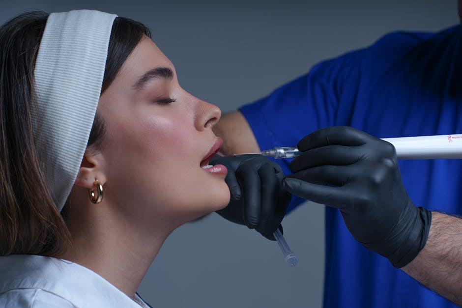 Close-up of a woman receiving a modern cosmetic treatment in a clinical setting.